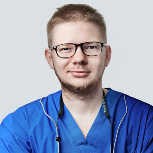 Łukasz Zadrożny implantolog chirurg dentysta Warszawa